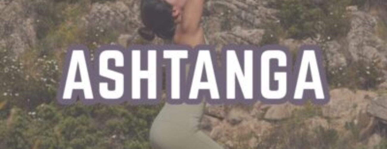 Ashtanga yoga poses woman practicing warrior pose outdoors on natural rock formation